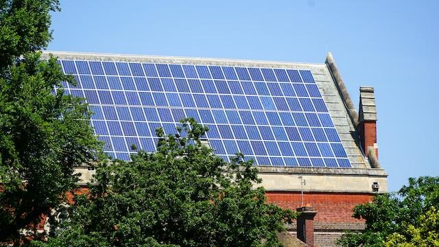 Solar panels on roof near trees